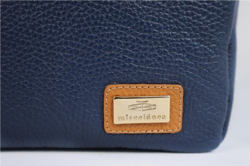 Bolso Bandolera Miscelánea de Piel: Estilo y Sofisticación Compacta