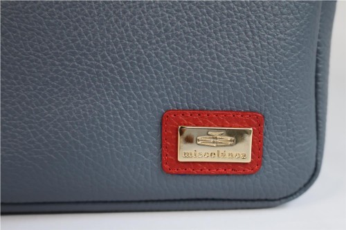 Bolso Bandolera Miscelánea de Piel: Estilo y Sofisticación Compacta