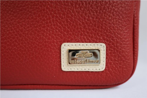 Bolso Bandolera Miscelánea de Piel: Estilo y Sofisticación Compacta
